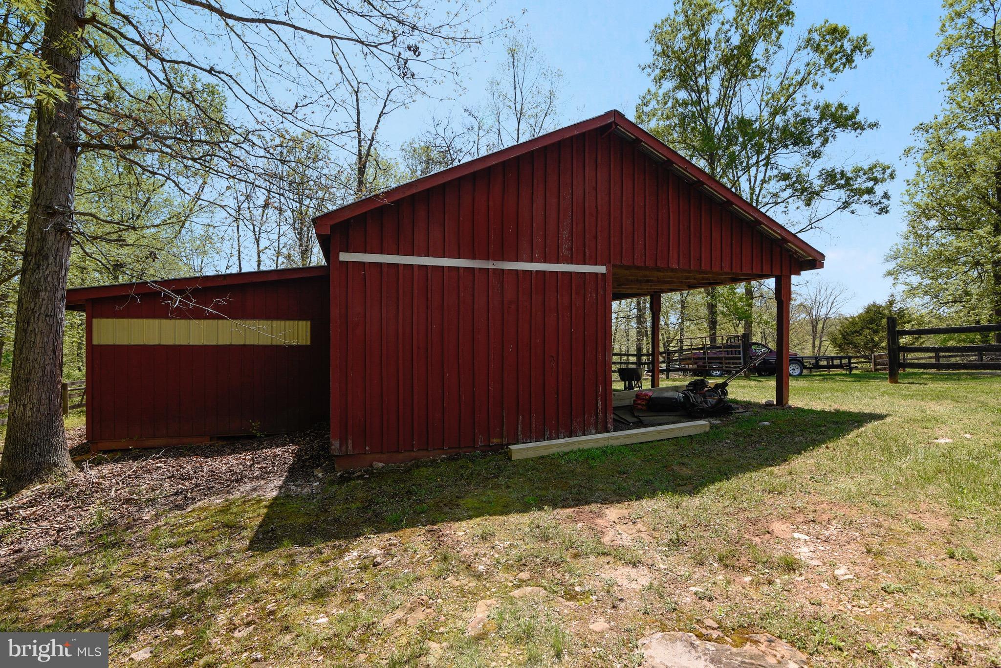 7142 Waterford Road Rixeyville, VA 22737 - Photo 22 of 25 a view of a house with backyard and trees