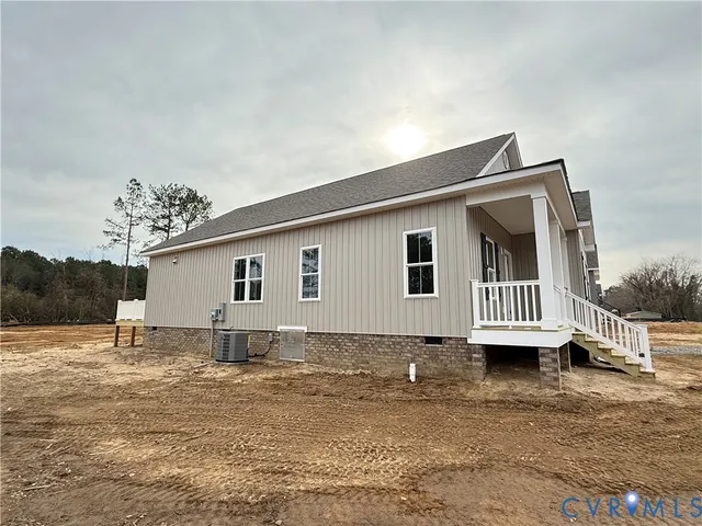 a view of living room with furniture and window