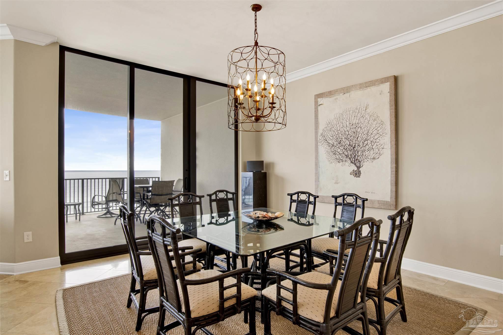 16547 Perdido Key Drive, Unit E501 Pensacola, FL 32507 - Photo 11 of 63 a view of a dining room with furniture window and outside view