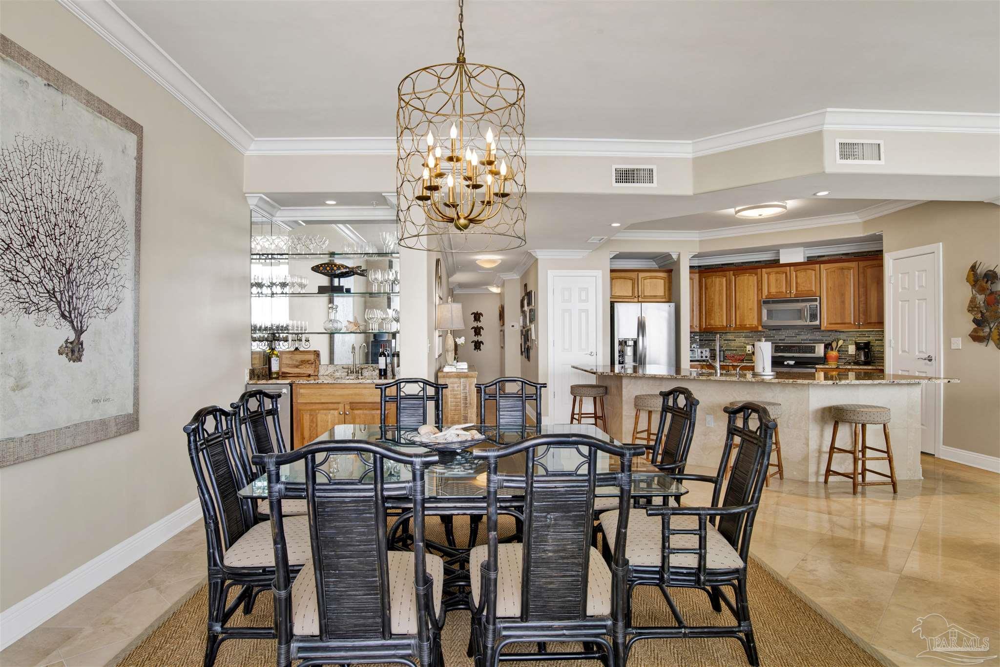 16547 Perdido Key Drive, Unit E501 Pensacola, FL 32507 - Photo 13 of 63 a view of a dining room with furniture window and outside view