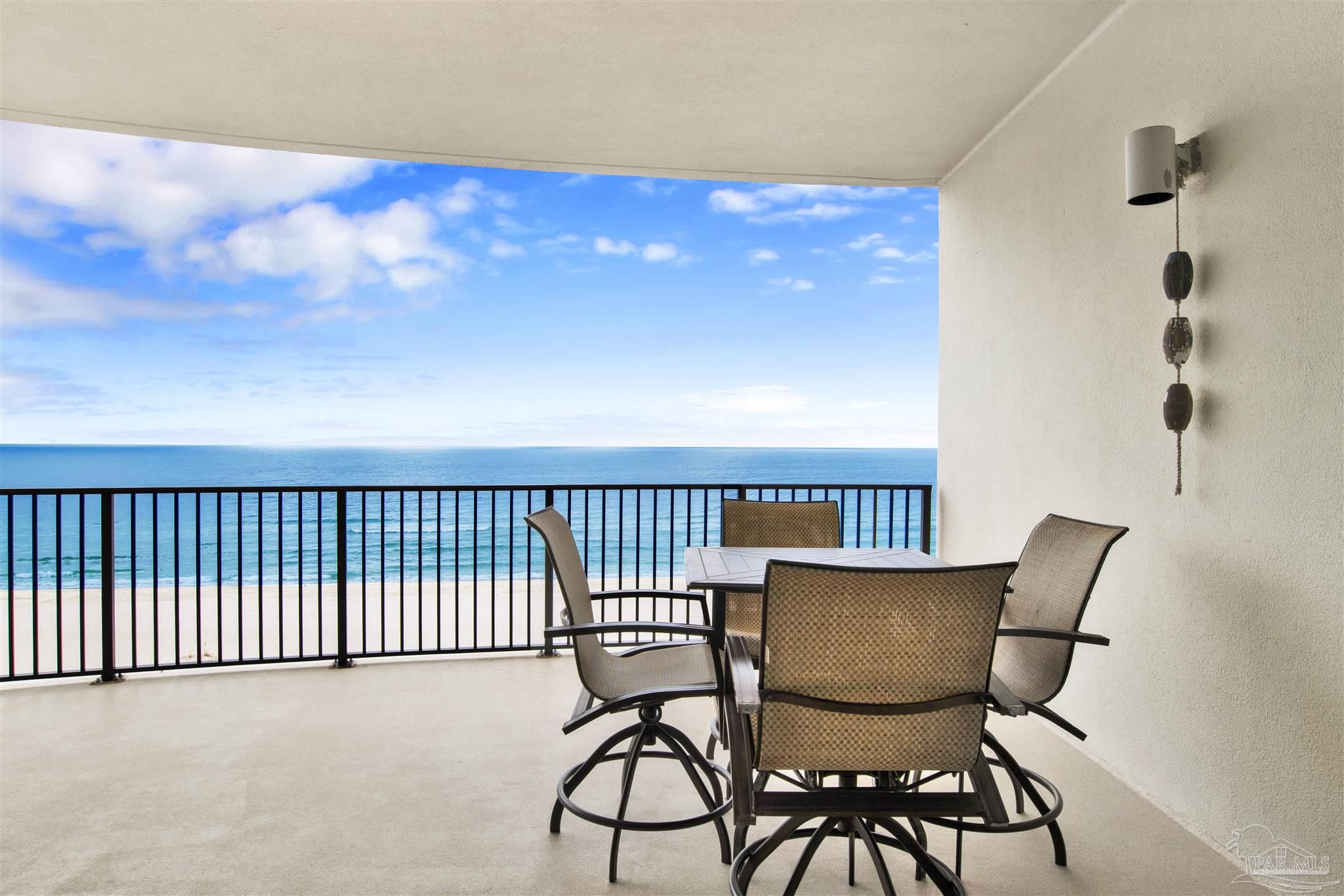 16547 Perdido Key Drive, Unit E501 Pensacola, FL 32507 - Photo 14 of 63 a view of a chairs and table in a room