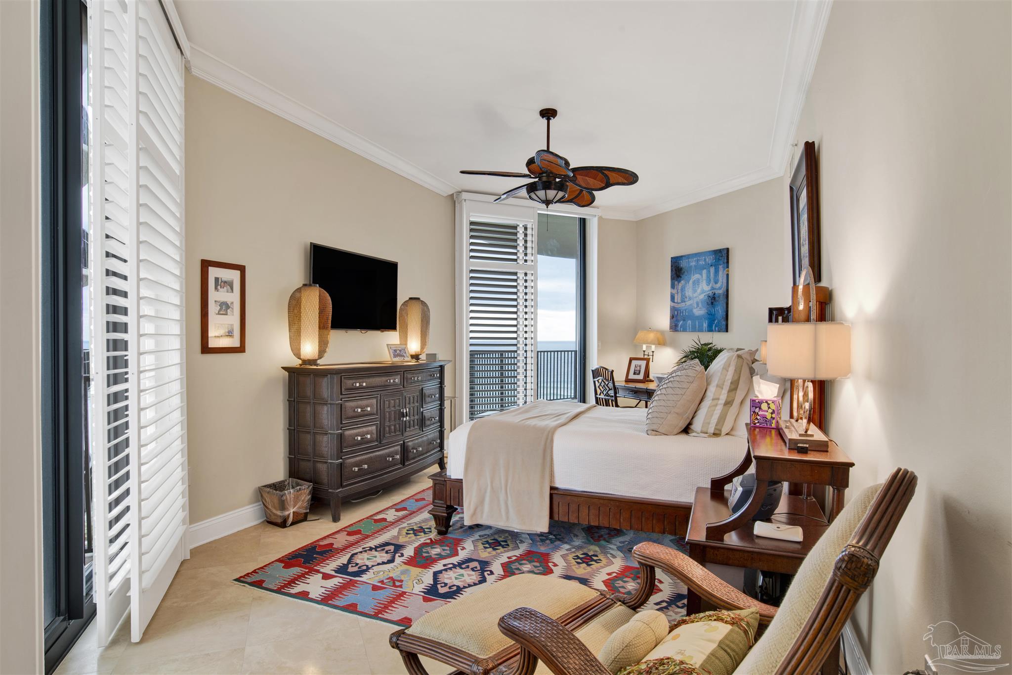 16547 Perdido Key Drive, Unit E501 Pensacola, FL 32507 - Photo 20 of 63 a living room with furniture and a fireplace