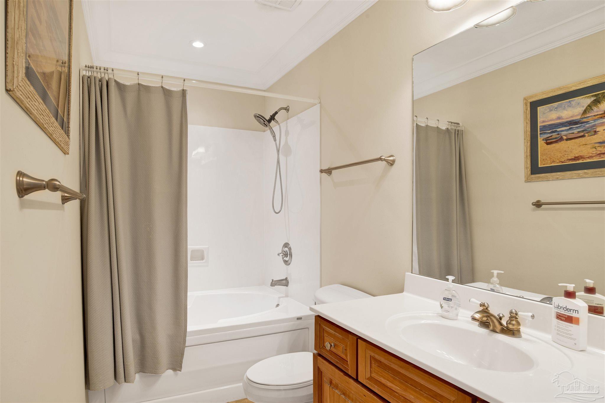 16547 Perdido Key Drive, Unit E501 Pensacola, FL 32507 - Photo 26 of 63 a bathroom with a sink toilet and shower