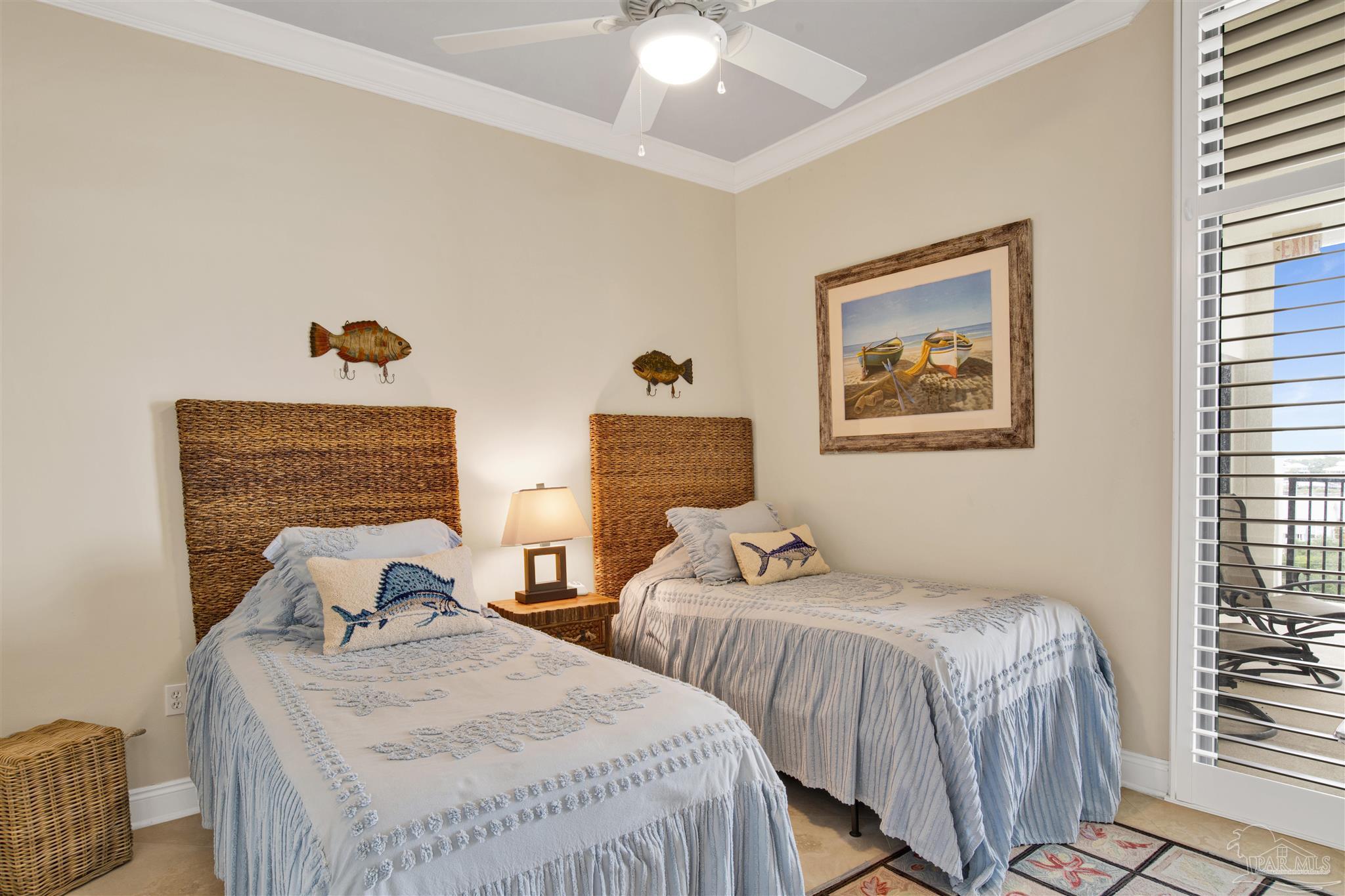 16547 Perdido Key Drive, Unit E501 Pensacola, FL 32507 - Photo 30 of 63 a bedroom with two beds and a window