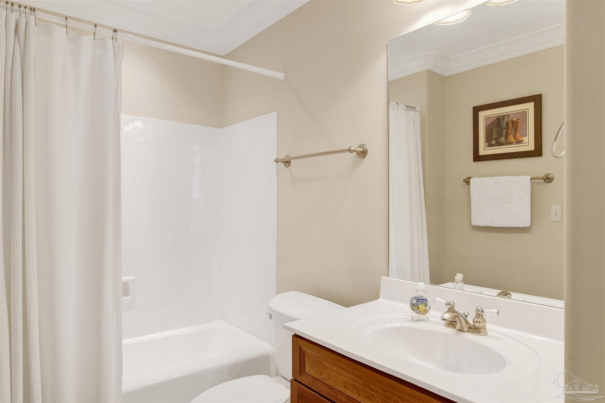 16547 Perdido Key Drive, Unit E501 Pensacola, FL 32507 - Photo 31 of 63 a bathroom with a sink and a bathtub
