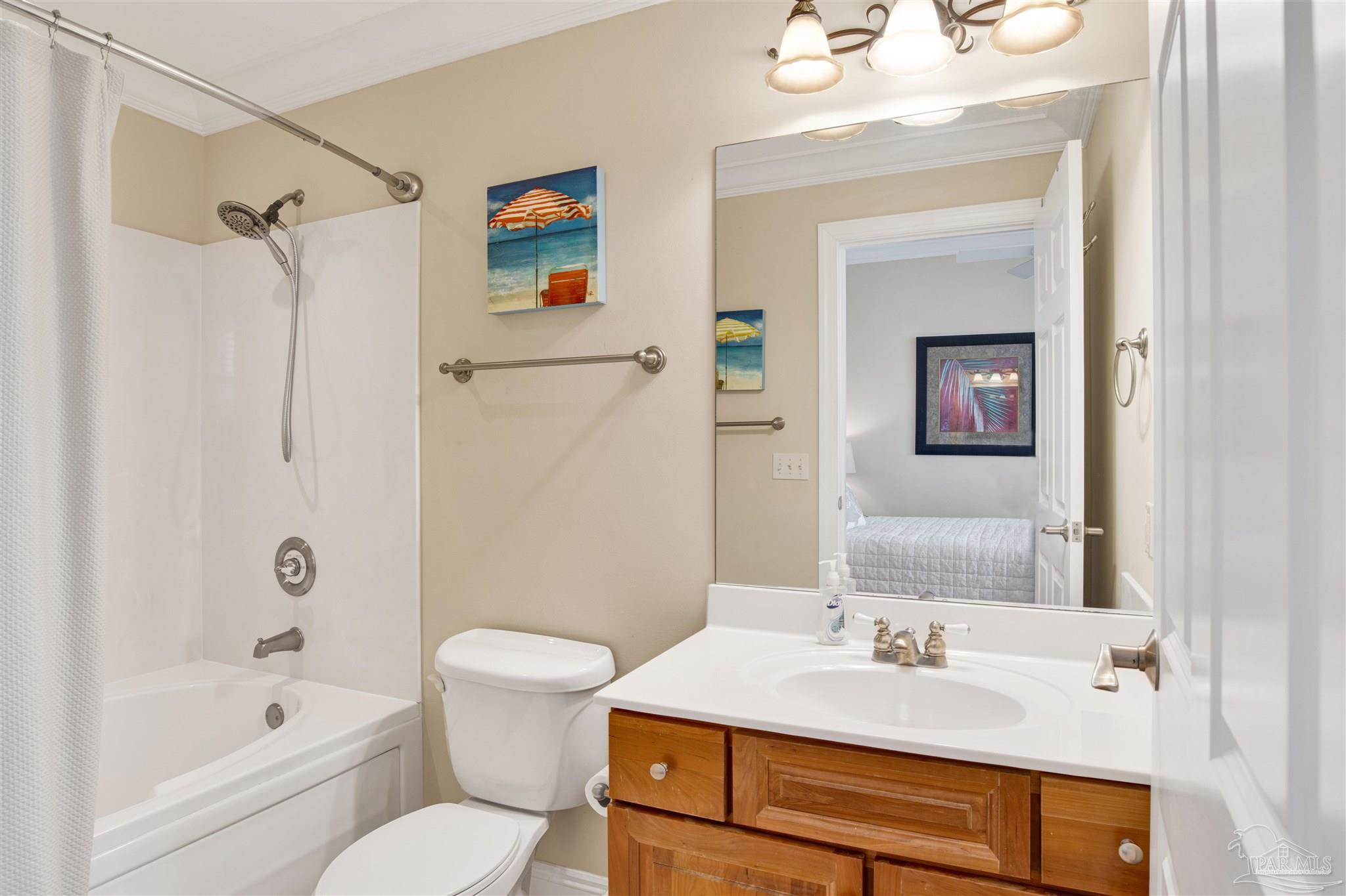16547 Perdido Key Drive, Unit E501 Pensacola, FL 32507 - Photo 33 of 63 a bathroom with a sink a toilet and shower