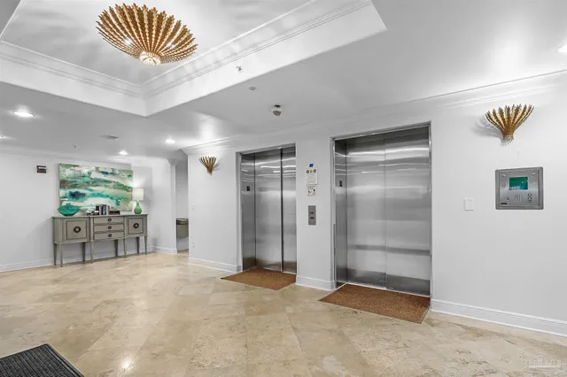 a view of a livingroom and a bathroom