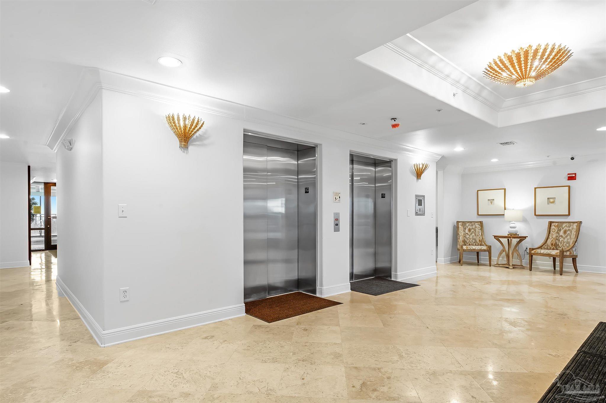 16547 Perdido Key Drive, Unit E501 Pensacola, FL 32507 - Photo 40 of 63 a view of a livingroom with a dinning table and chair