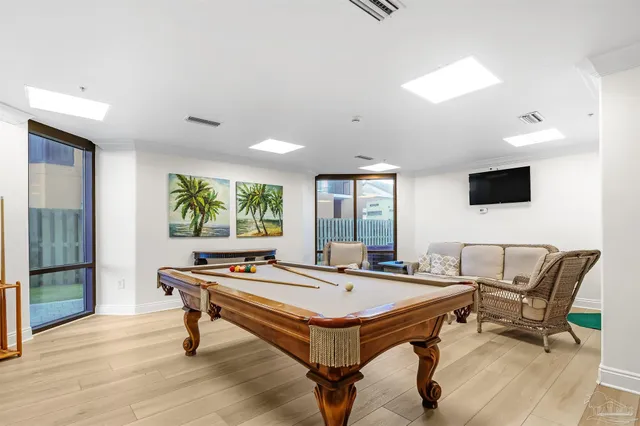 a view of a swimming pool with a yard