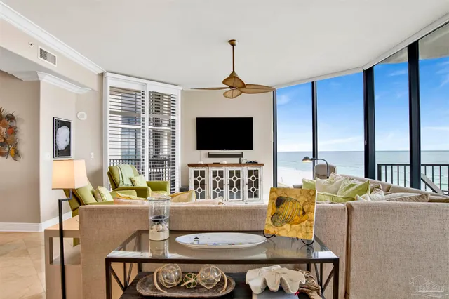 a kitchen with stainless steel appliances granite countertop a stove a sink dishwasher and a microwave oven with cabinets