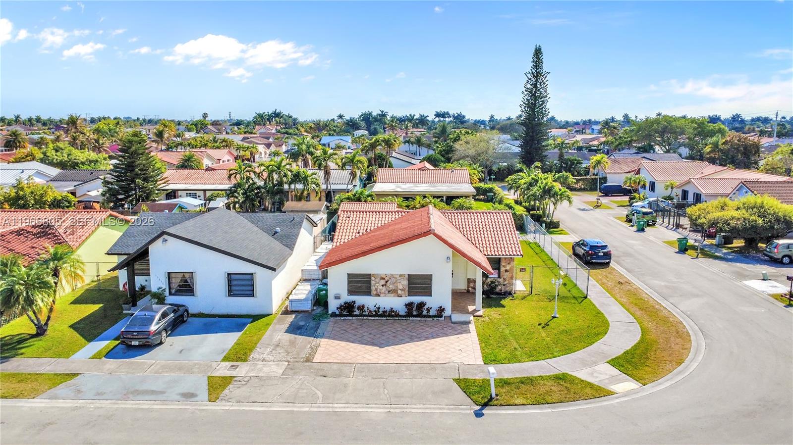 13844 Southwest 15th Street Miami, FL 33184 - Photo 16 of 31 a aerial view of a house with swimming pool and porch