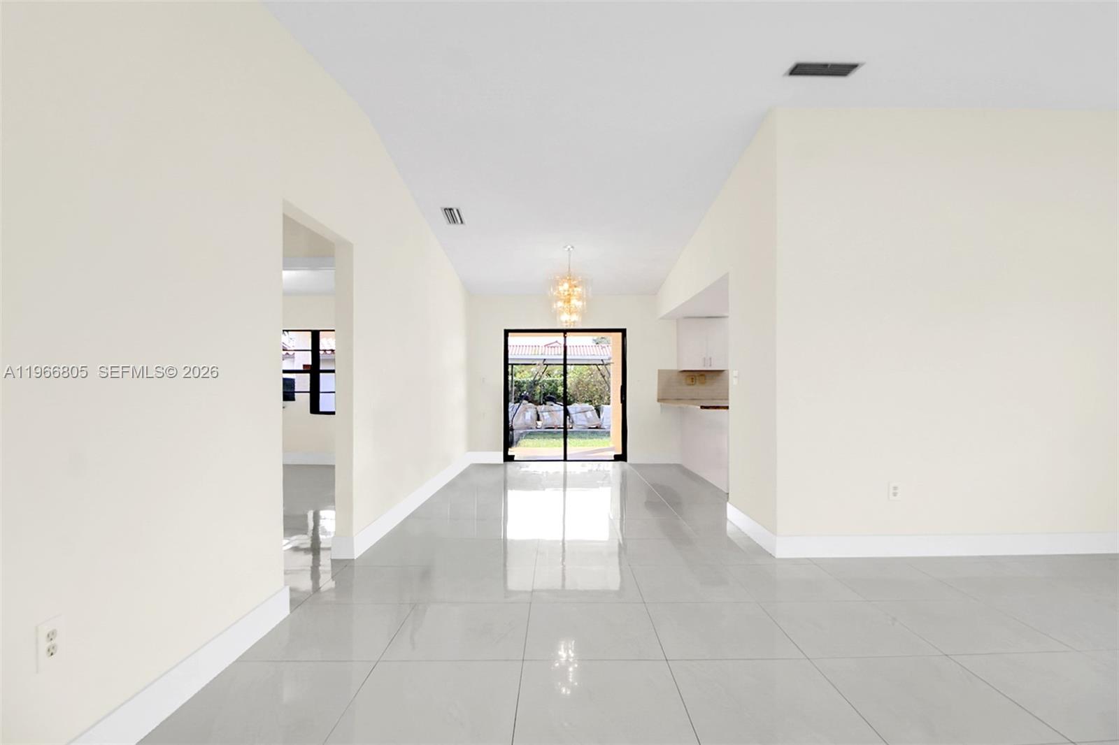 13844 Southwest 15th Street Miami, FL 33184 - Photo 20 of 31 a view of an empty room with a window