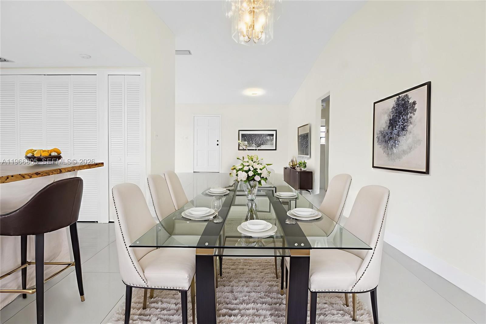 13844 Southwest 15th Street Miami, FL 33184 - Photo 6 of 31 a view of a dining room with furniture