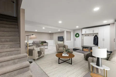a living room with furniture and a table