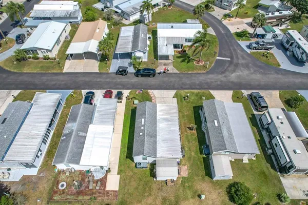 an aerial view of residential house with outdoor space