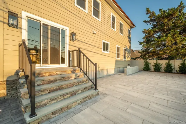 a view of a house with a street