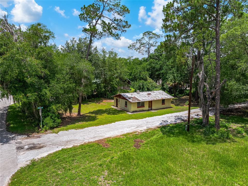 101 Pecan Street Palatka, FL 32177 - Photo 11 of 11 a view of yard with swimming pool and green space