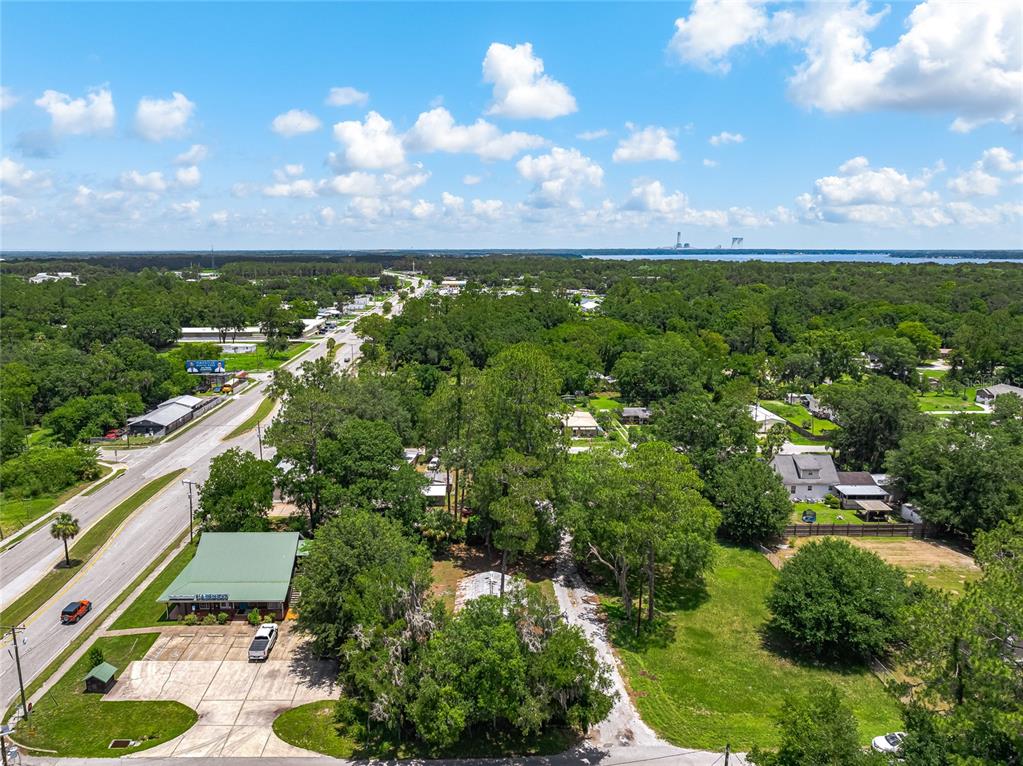 101 Pecan Street Palatka, FL 32177 - Photo 2 of 11 a view of a city with lush green forest