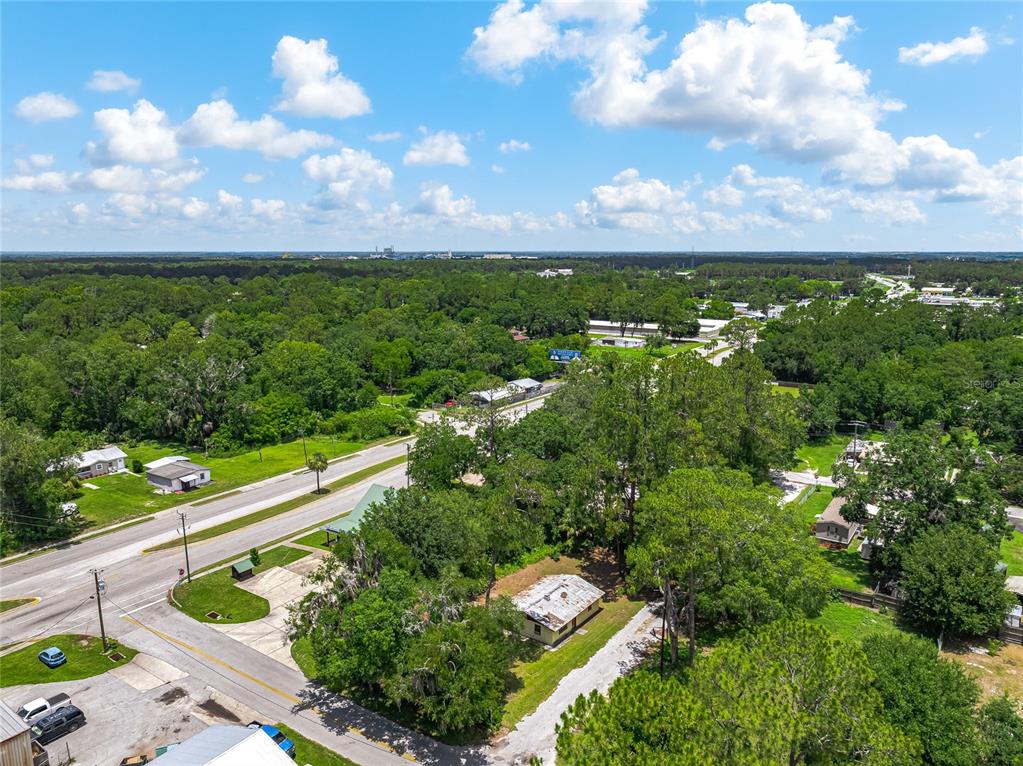 101 Pecan Street Palatka, FL 32177 - Photo 3 of 11 a view of a city street lush green space