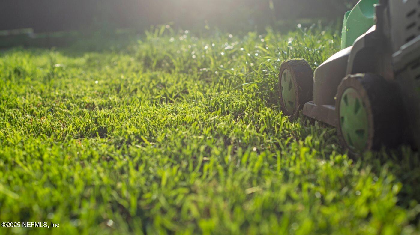 42 Hogan Court St. Augustine, FL 32092 - Photo 18 of 83 IND_Pic_Lawnmower_Sunset_Stock_AdobeStoc
