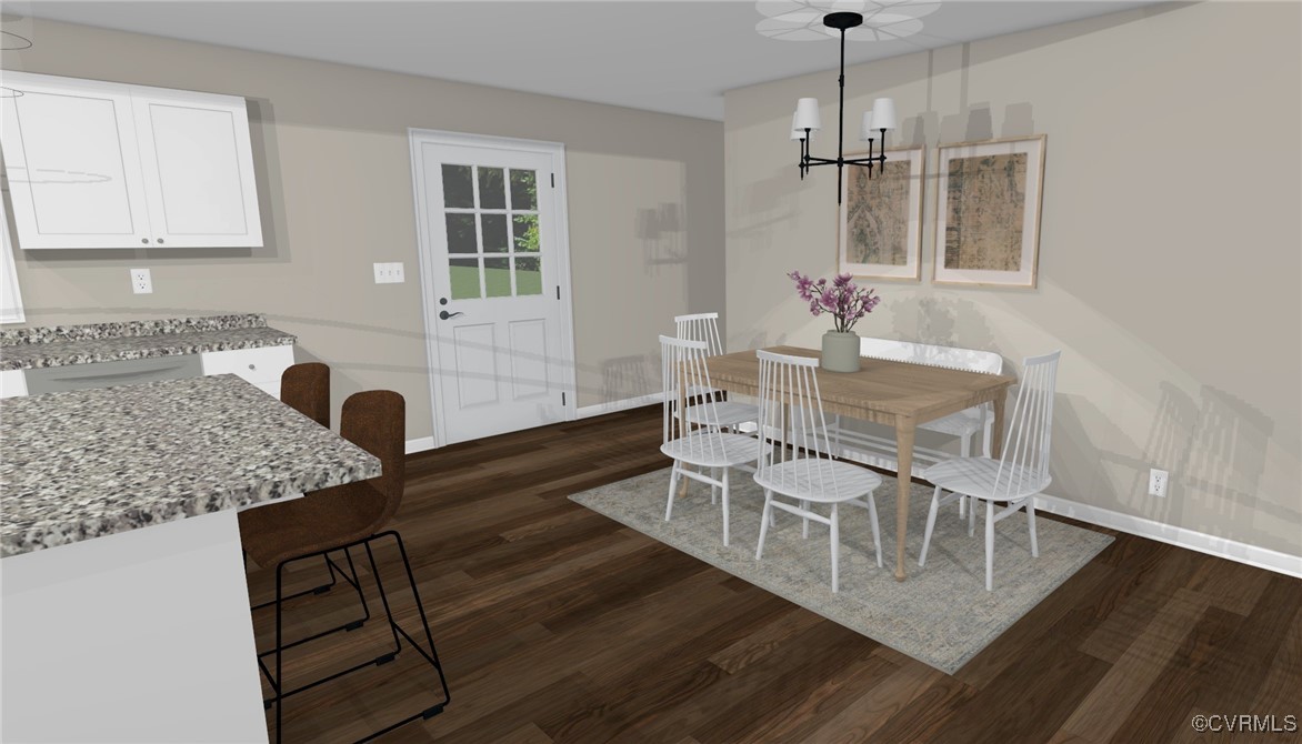 1833 Bumpass Road Bumpass, VA 23024 - Photo 24 of 25 Dining space with dark wood-type flooring, baseboa