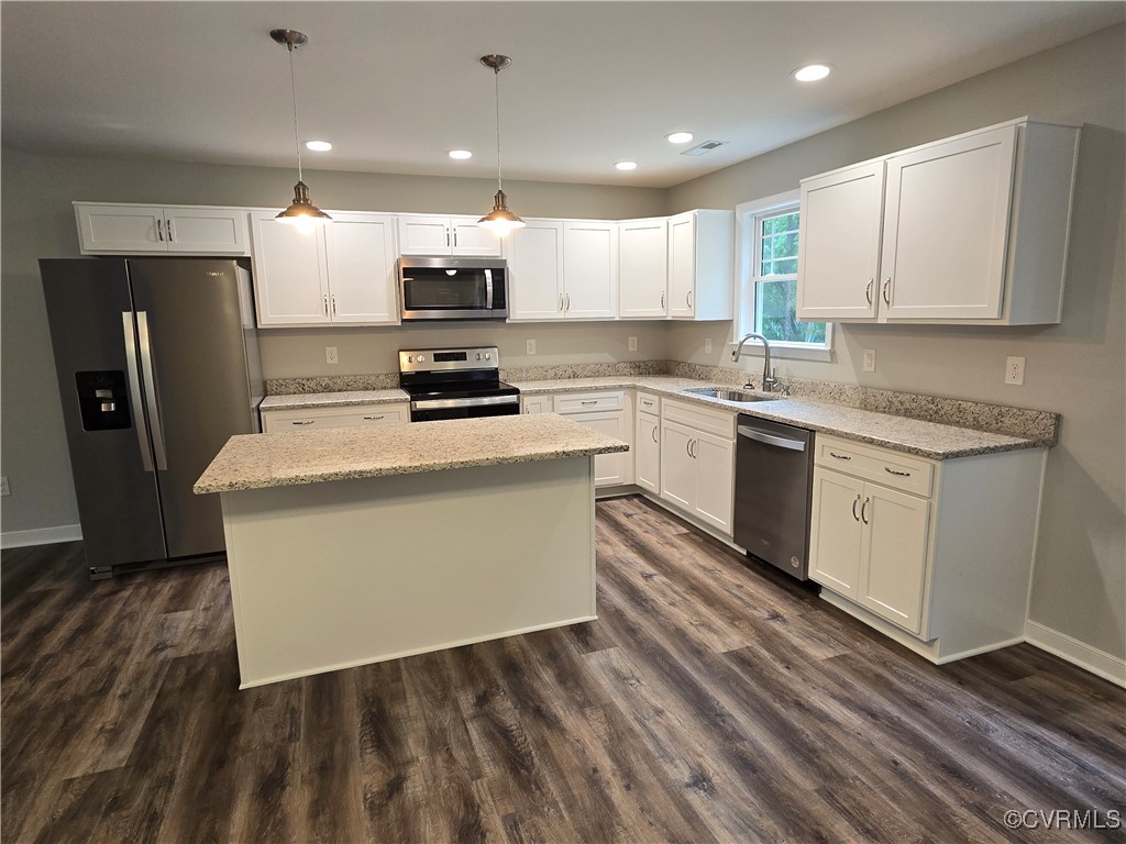 1833 Bumpass Road Bumpass, VA 23024 - Photo 3 of 25 Kitchen featuring stainless steel appliances, a ce