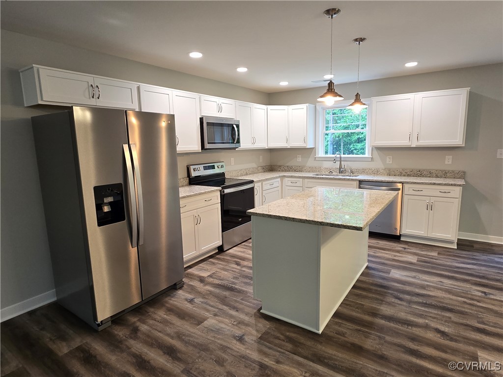 1833 Bumpass Road Bumpass, VA 23024 - Photo 4 of 25 Kitchen featuring dark wood-type flooring, white c