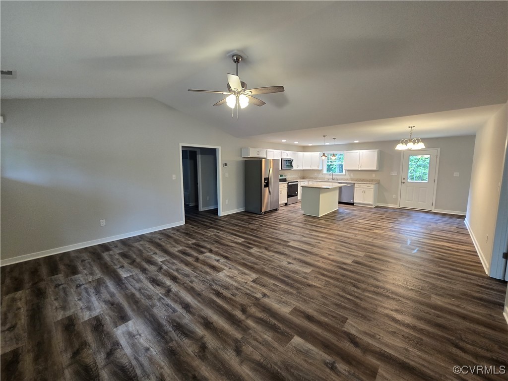 1833 Bumpass Road Bumpass, VA 23024 - Photo 5 of 25 Unfurnished living room featuring baseboards, dark