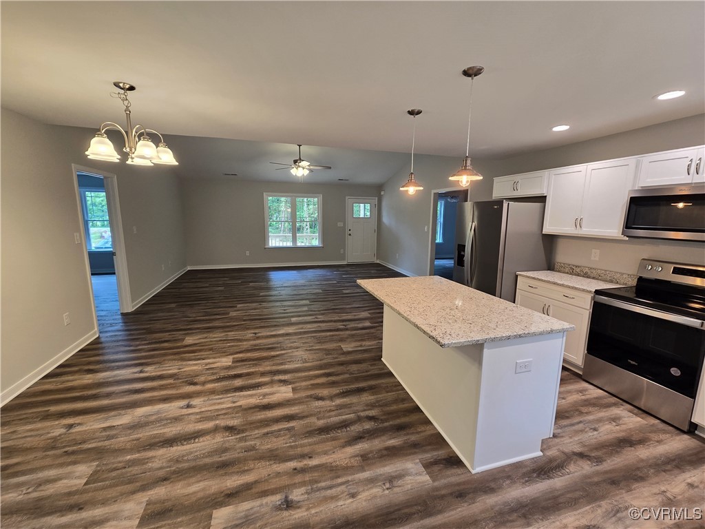 1833 Bumpass Road Bumpass, VA 23024 - Photo 7 of 25 Kitchen featuring white cabinetry, appliances with