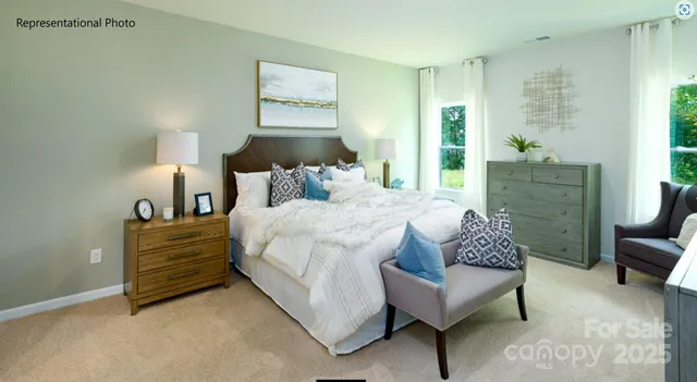 a bedroom with a bed and a couch