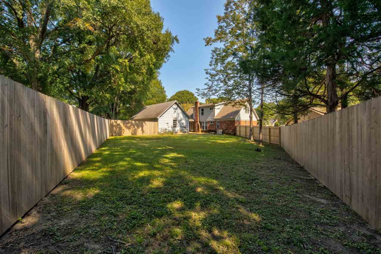 6485 Ruffle Cove Bartlett, TN 38134 - Photo 24 of 24 This spacious rear yard could have multiple uses including a play area, garden, possibly a pool, etc.