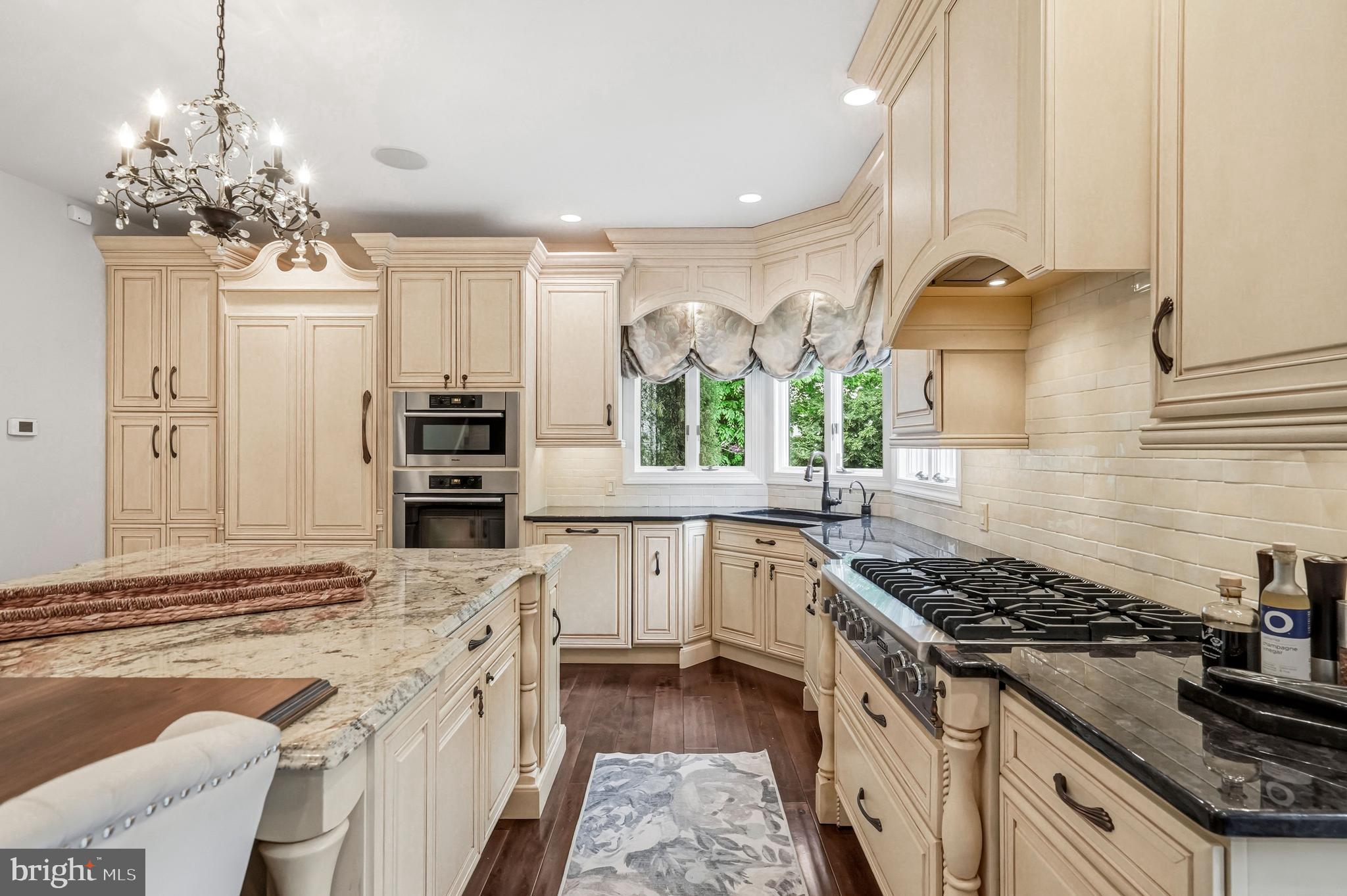 53 Stanwyck Road Mount Laurel, NJ 08054 - Photo 11 of 85 a kitchen with stainless steel appliances a stove sink and cabinets