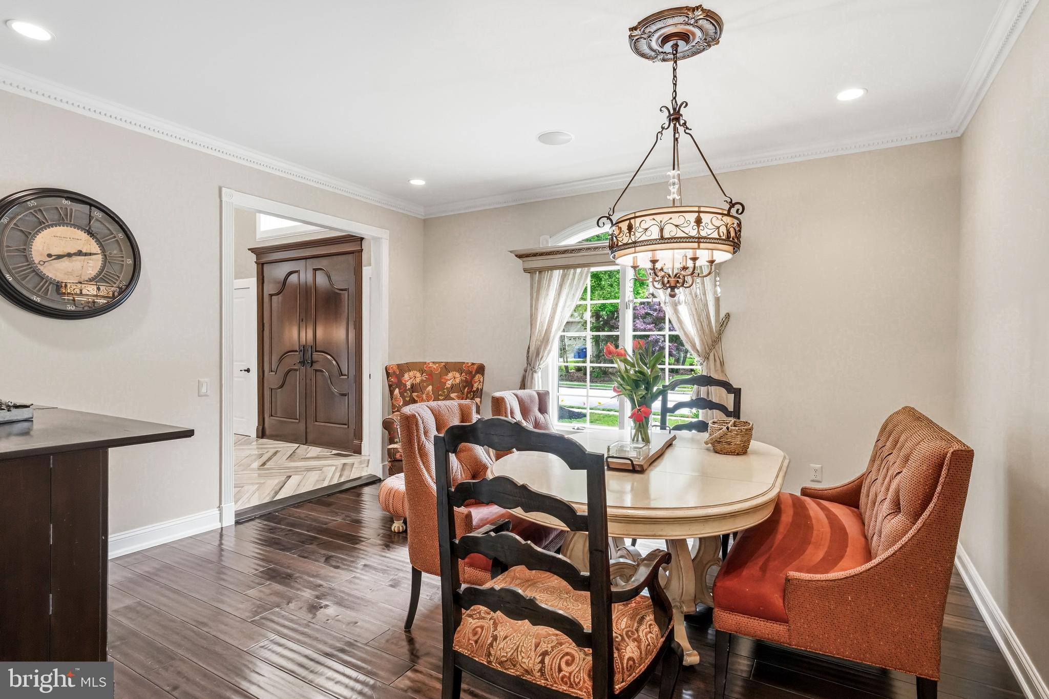 53 Stanwyck Road Mount Laurel, NJ 08054 - Photo 20 of 85 a dining room with furniture a chandelier and wooden floor