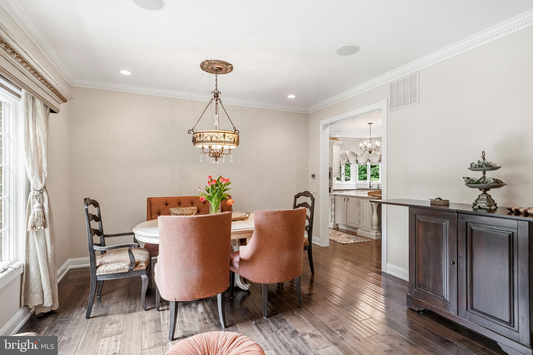 53 Stanwyck Road Mount Laurel, NJ 08054 - Photo 21 of 85 a view of a dining room with furniture wooden floor and a chandelier