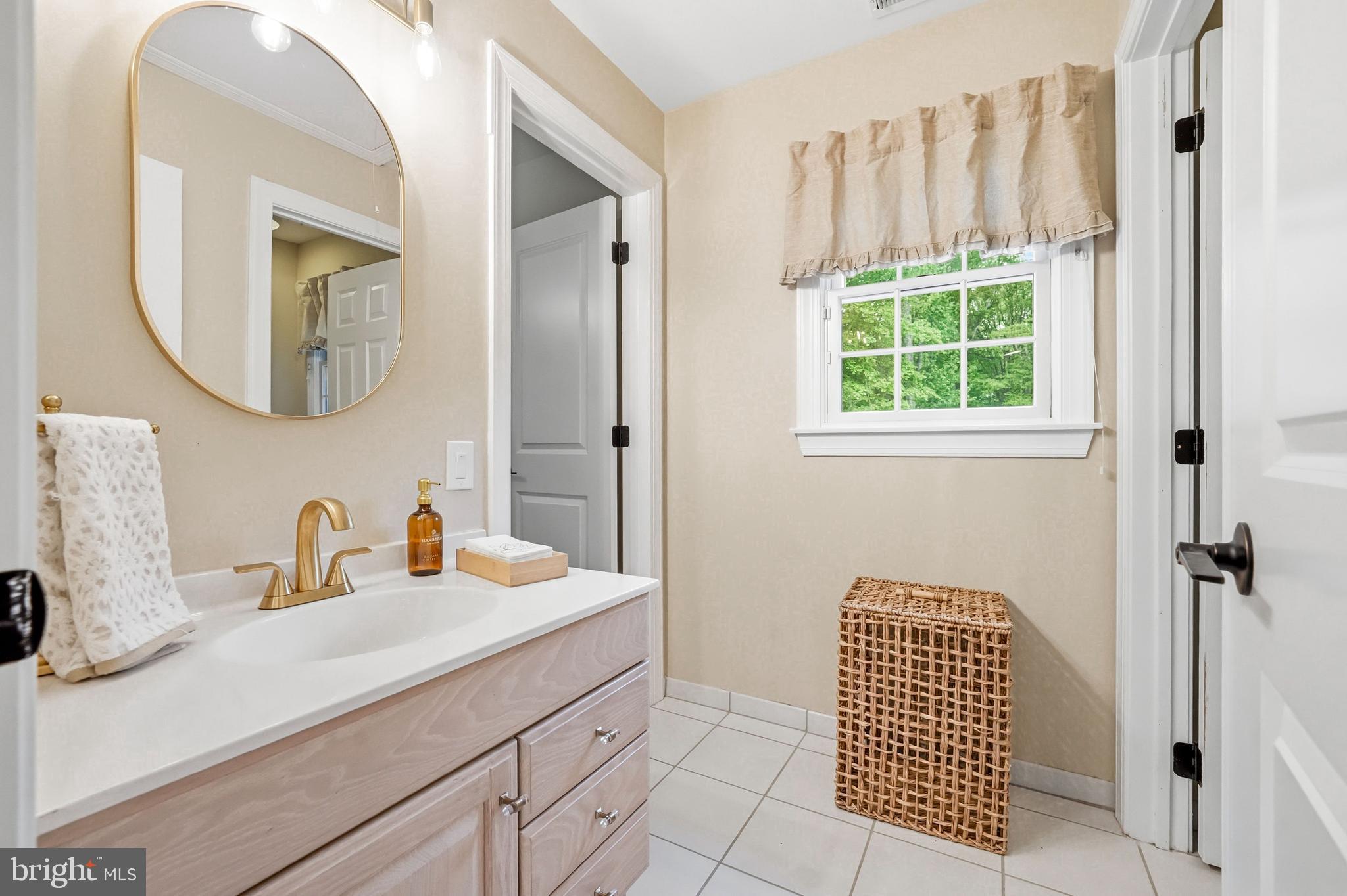 53 Stanwyck Road Mount Laurel, NJ 08054 - Photo 40 of 85 a bathroom with a sink and a mirror