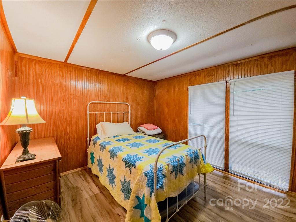 278 Pipers Neck Rutherfordton, NC 28139 - Photo 28 of 42 a bedroom with a bed and dresser
