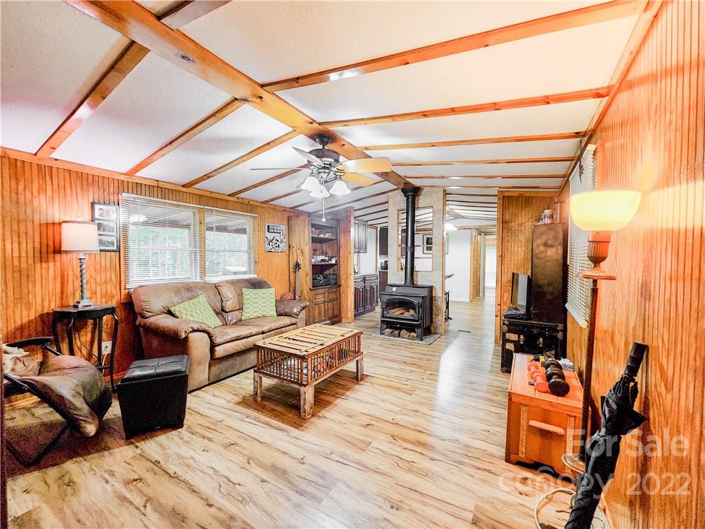 278 Pipers Neck Rutherfordton, NC 28139 - Photo 5 of 42 a living room with furniture and a wooden floor