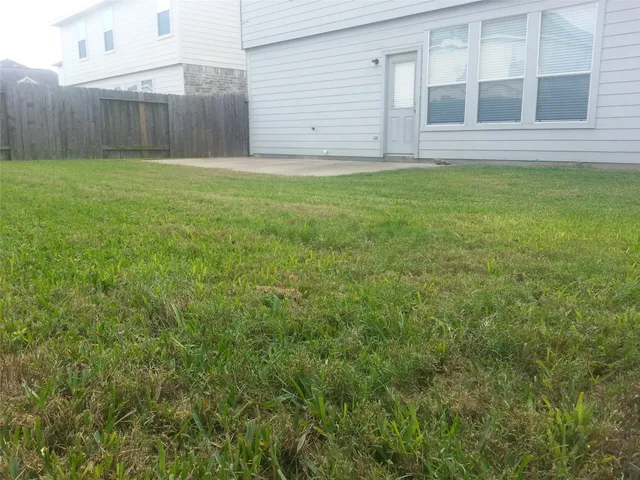 a view of a terrace with sitting area