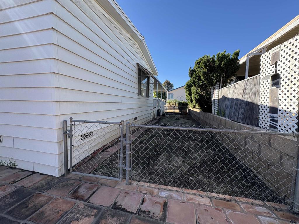 15420 Olde Highway 80 El Cajon, CA 92021 - Photo 11 of 48 a view of a house with a tree