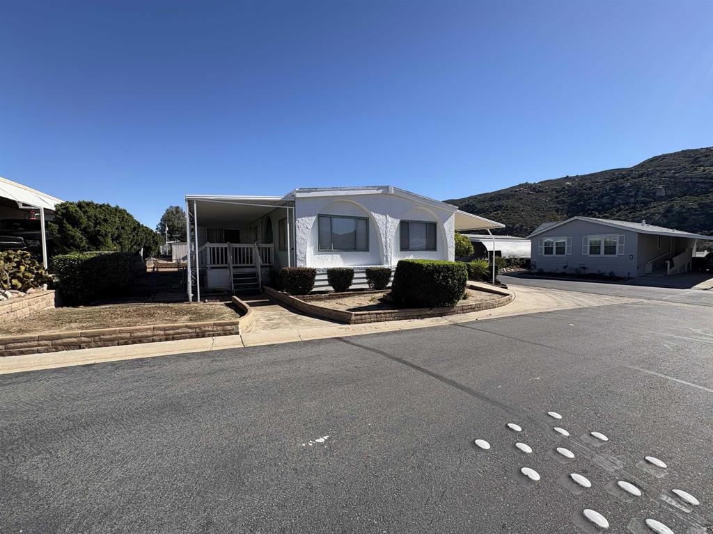 15420 Olde Highway 80 El Cajon, CA 92021 - Photo 19 of 48 a view of a street with houses