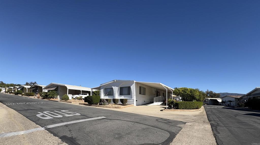 15420 Olde Highway 80 El Cajon, CA 92021 - Photo 2 of 48 a front view of a building with cars parked