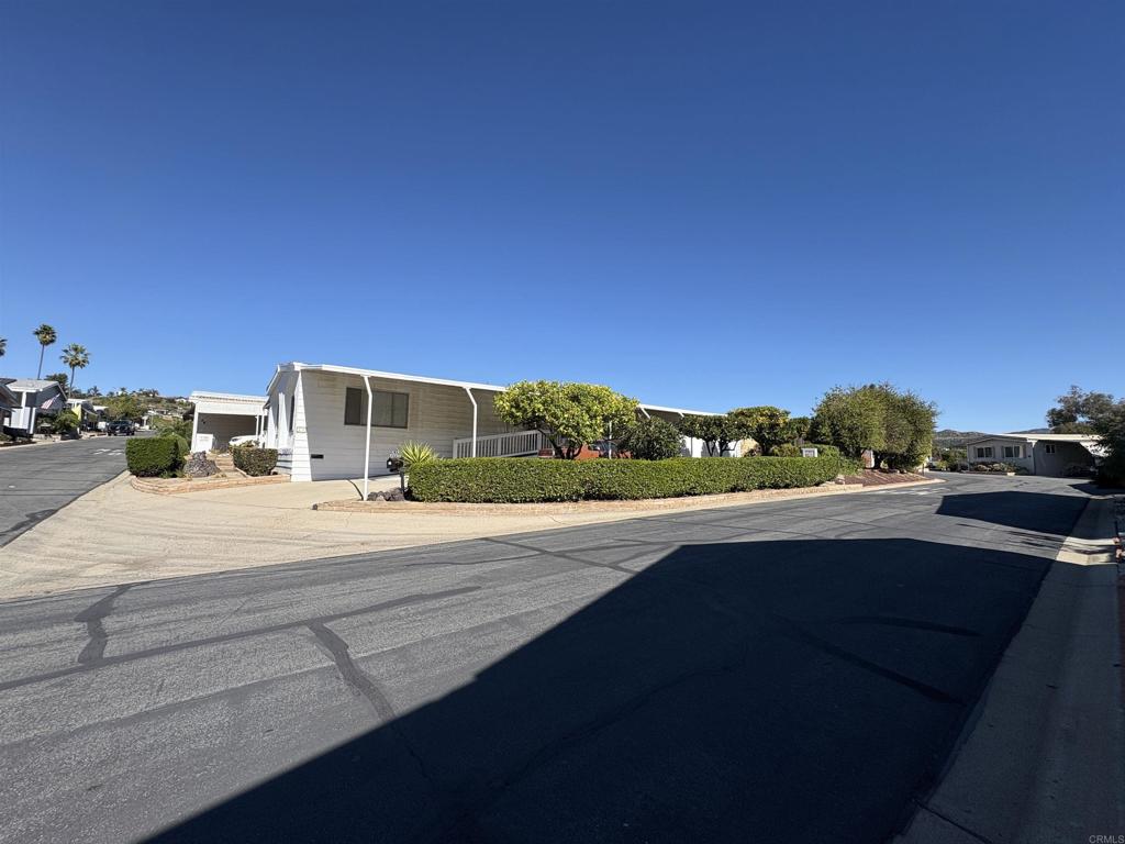 15420 Olde Highway 80 El Cajon, CA 92021 - Photo 22 of 48 a view of city street with a house