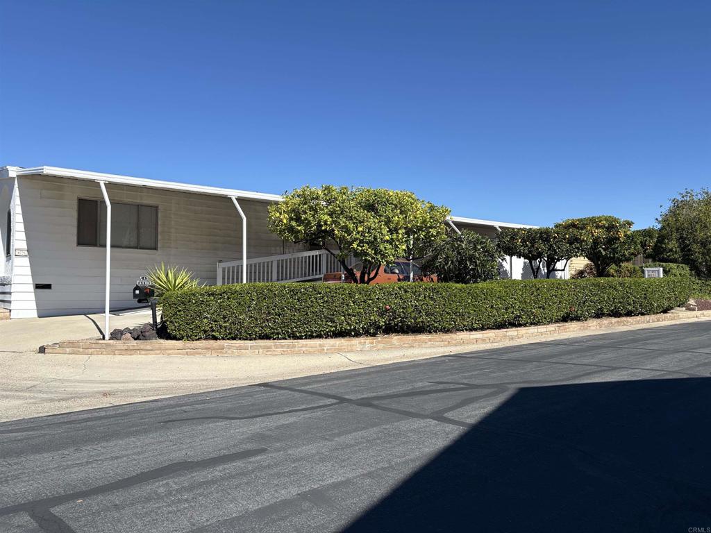 15420 Olde Highway 80 El Cajon, CA 92021 - Photo 23 of 48 a view of a house with a yard