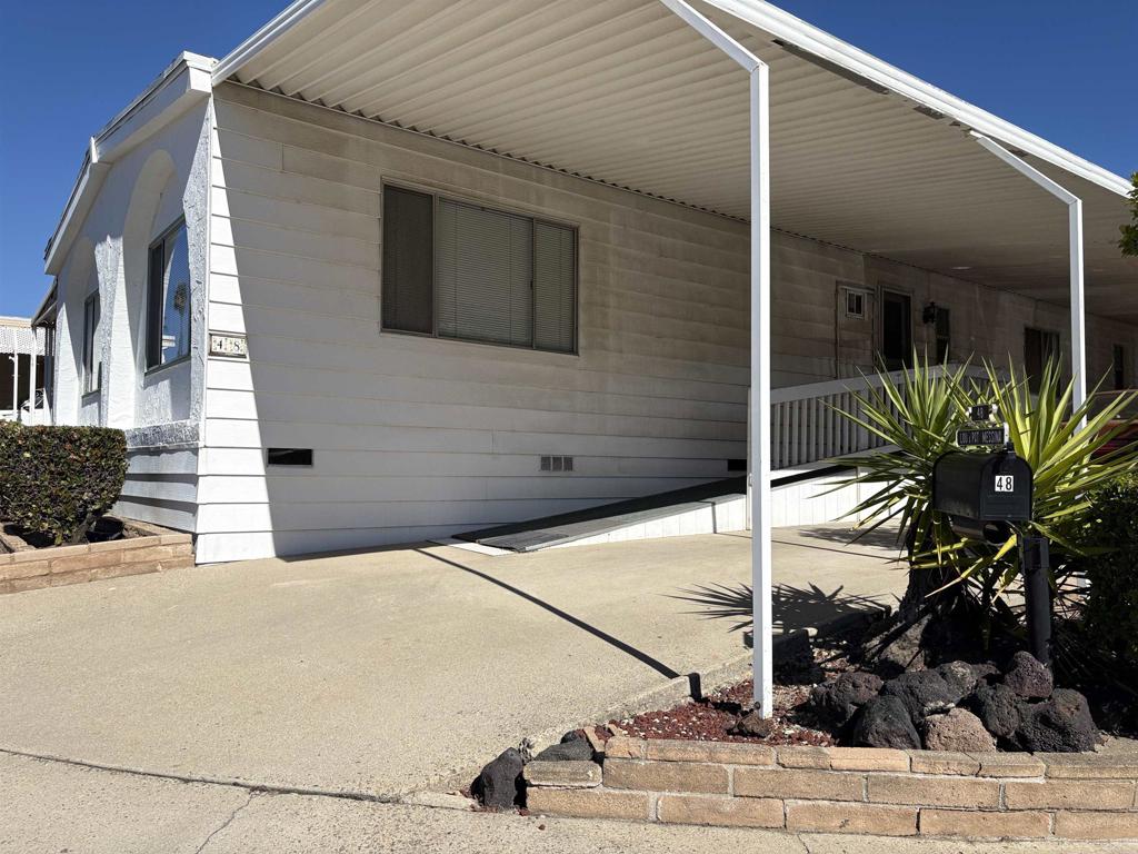 15420 Olde Highway 80 El Cajon, CA 92021 - Photo 24 of 48 a potted plant sitting on the side of a building