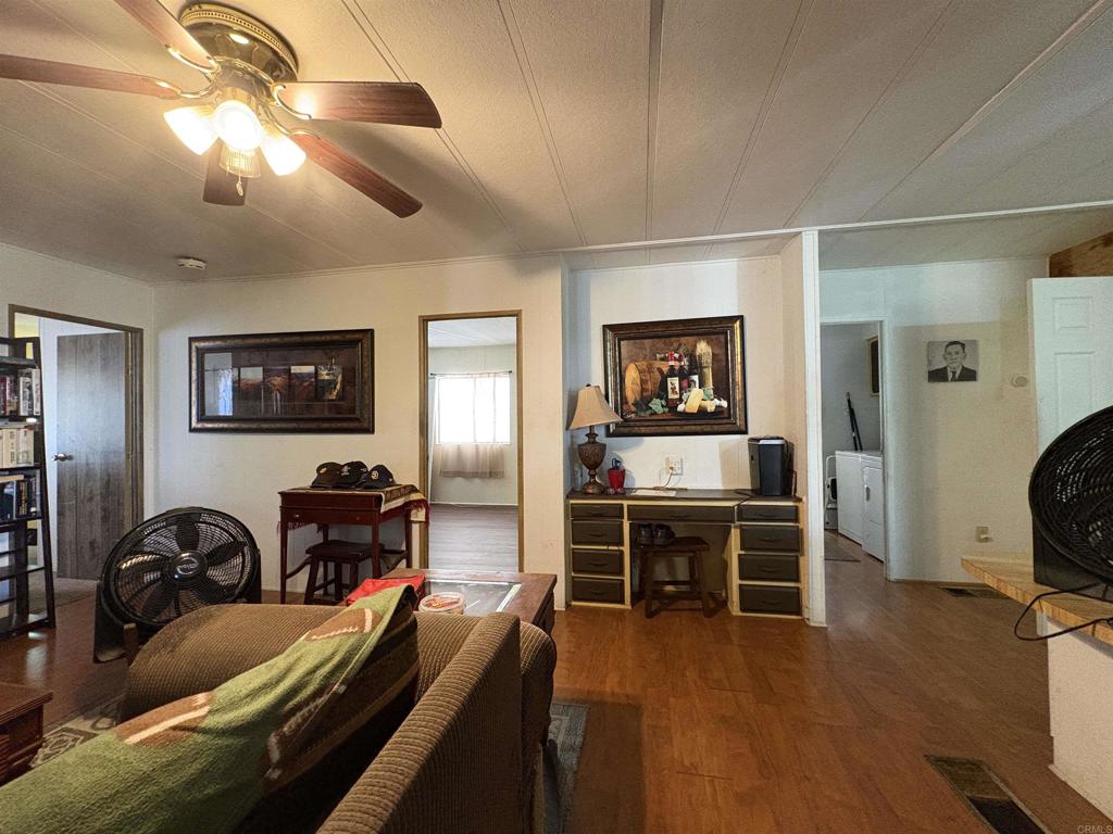 15420 Olde Highway 80 El Cajon, CA 92021 - Photo 38 of 48 a view of a livingroom with furniture and a flat screen tv