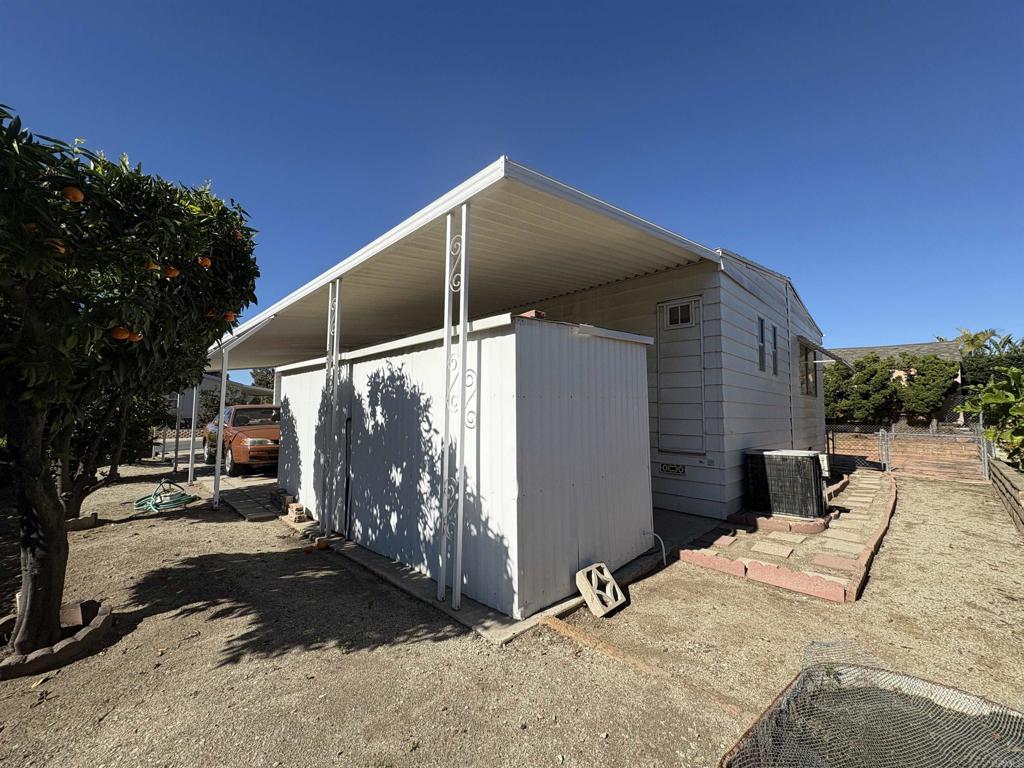 15420 Olde Highway 80 El Cajon, CA 92021 - Photo 4 of 48 a house view with a outdoor space