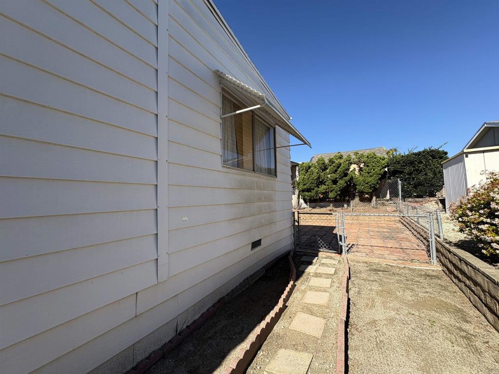 15420 Olde Highway 80 El Cajon, CA 92021 - Photo 7 of 48 a view of house with backyard