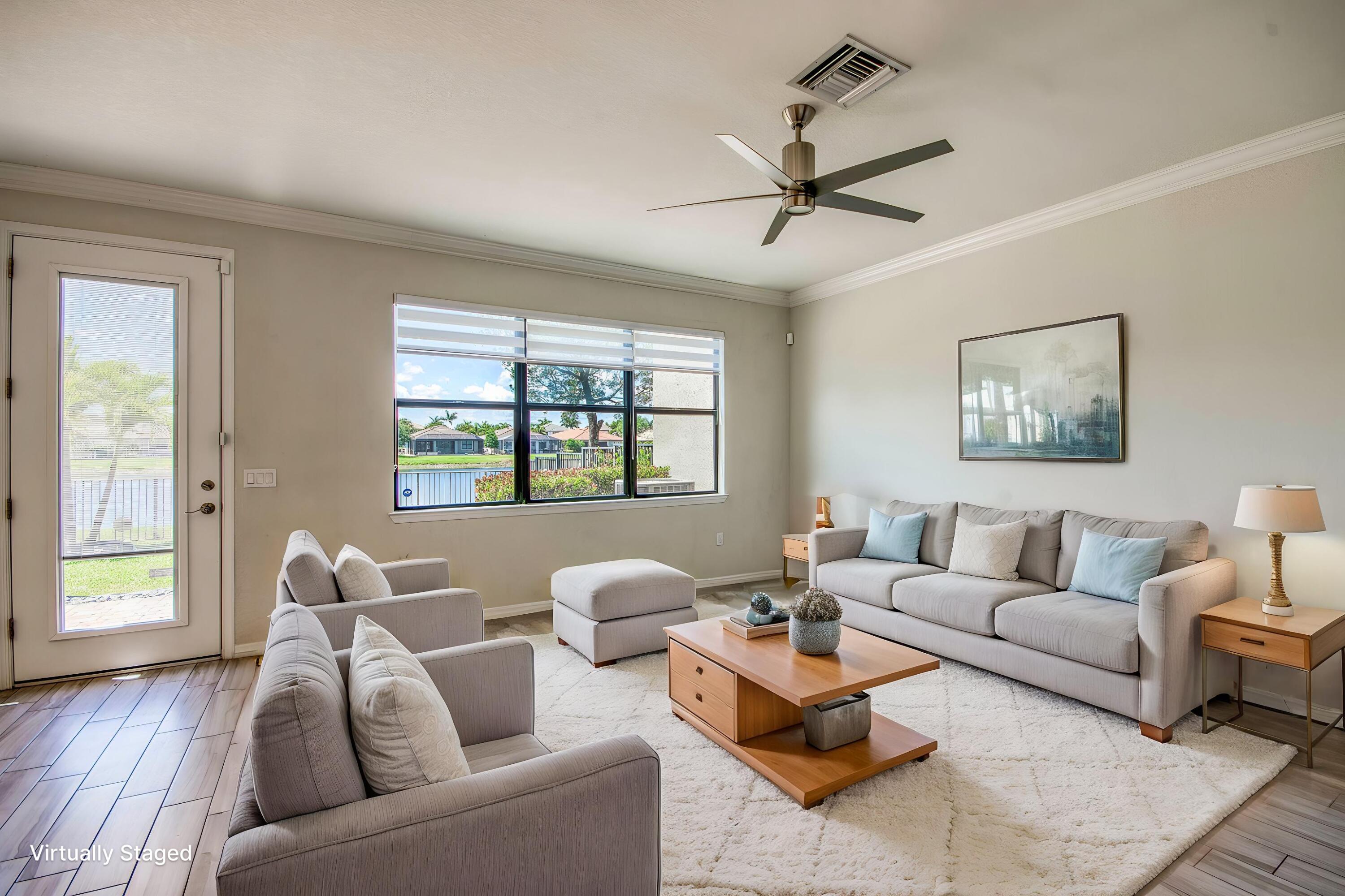8301 Rearing Lane Lake Worth, FL 33467 - Photo 9 of 33 a living room with furniture and a large window
