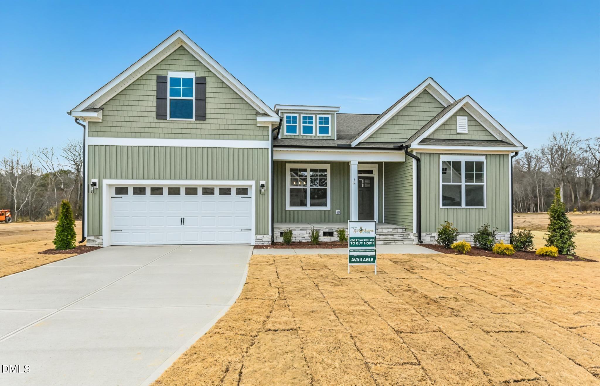 72 South Bream Court Angier, NC 27501 - Photo 1 of 44 a front view of a house with a outdoor space