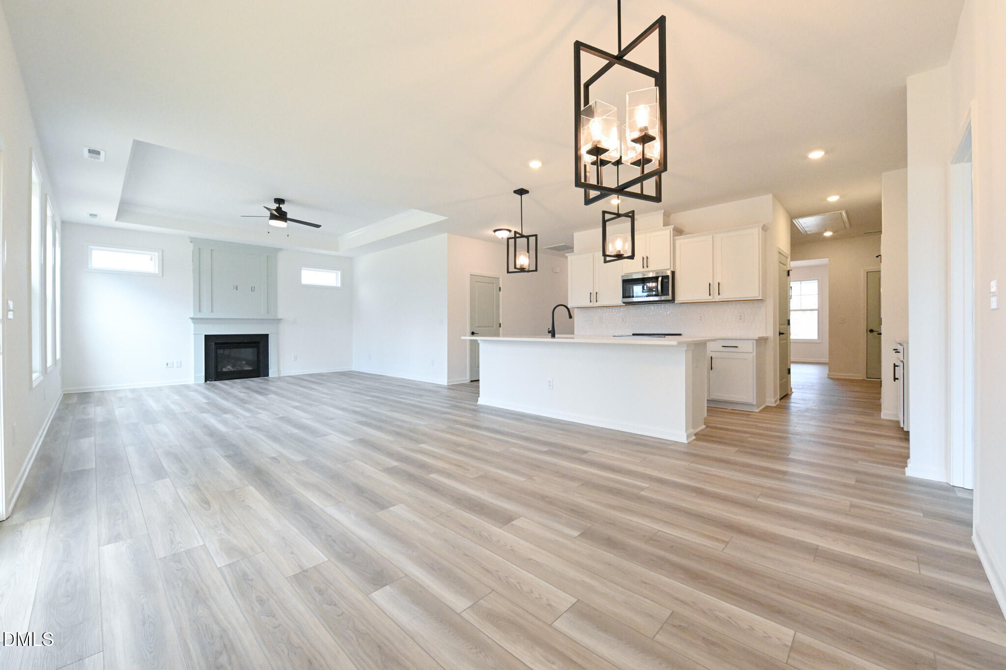 72 South Bream Court Angier, NC 27501 - Photo 16 of 44 a view of a kitchen with cabinets and wooden floor